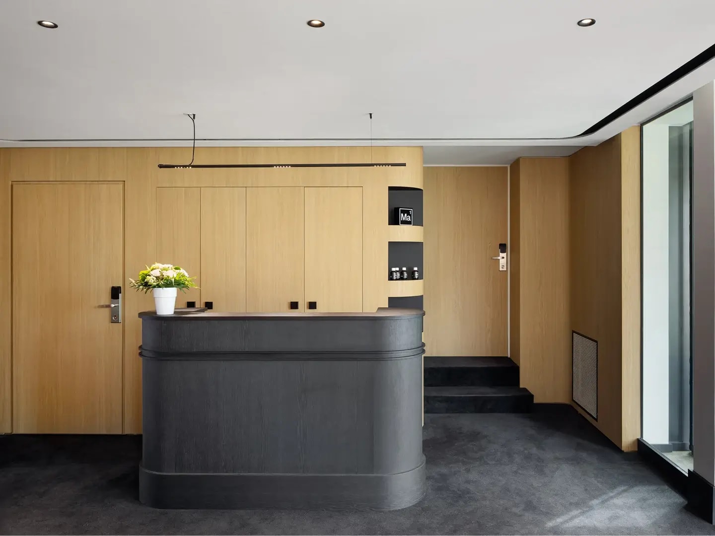 Interior featuring RealGrain Tervuren blonde timber-look surface.